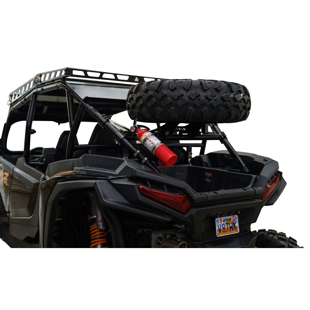 Black Tusk spare tire carrier installed on a Polaris RZR XP; vehicle, spare wheel, tire, fire extinguisher and other accessories not included.
